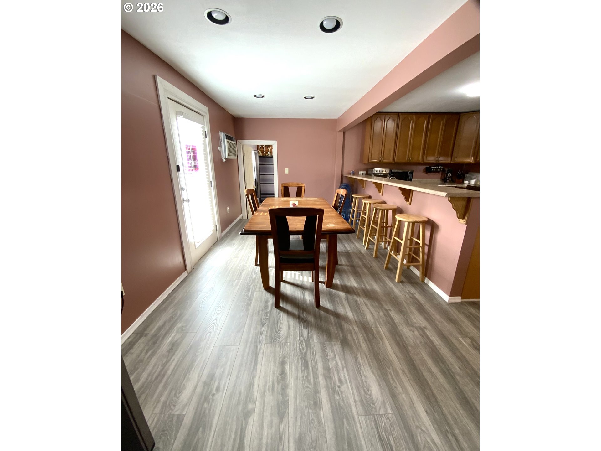 400 West 6th Street The Dalles, OR 97058 - Photo 23 of 28 a dining room with furniture and wooden floor