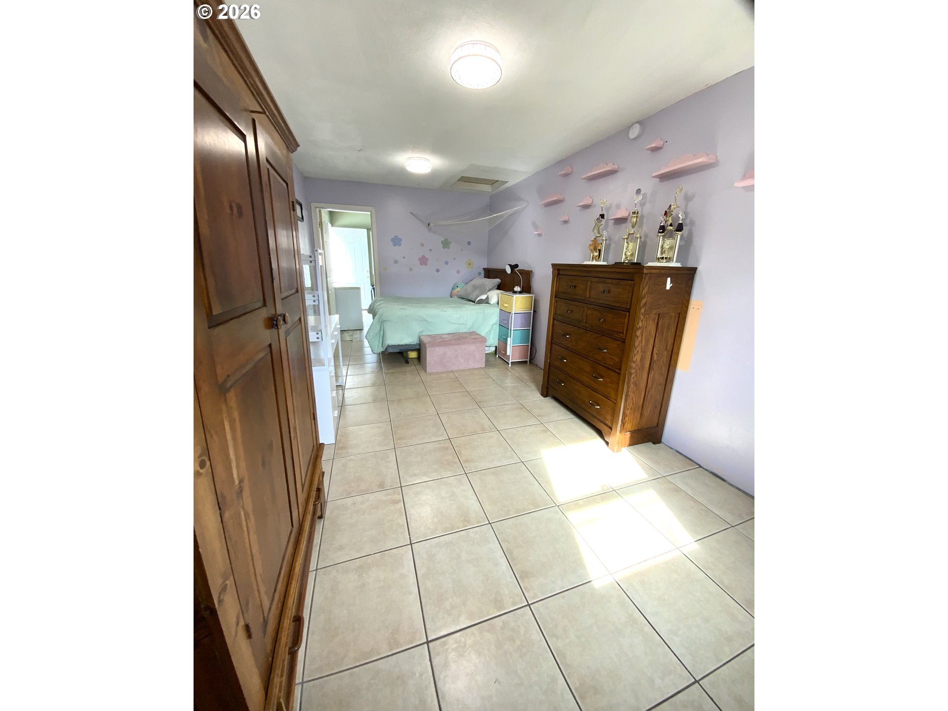 400 West 6th Street The Dalles, OR 97058 - Photo 25 of 28 a view of a kitchen with a refrigerator