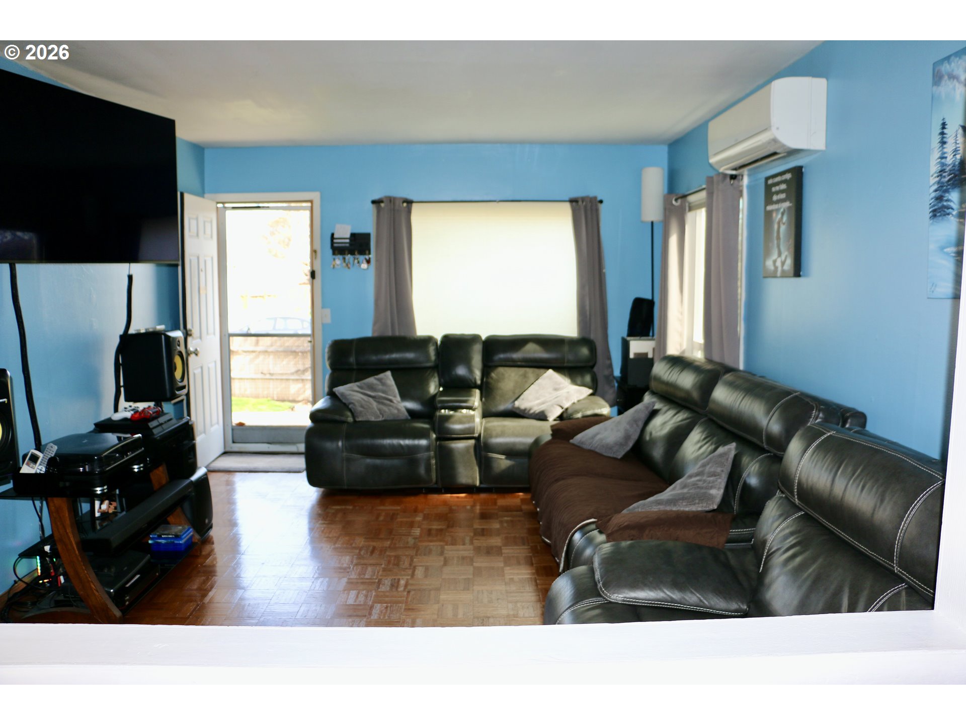 400 West 6th Street The Dalles, OR 97058 - Photo 5 of 28 a living room with furniture and a flat screen tv