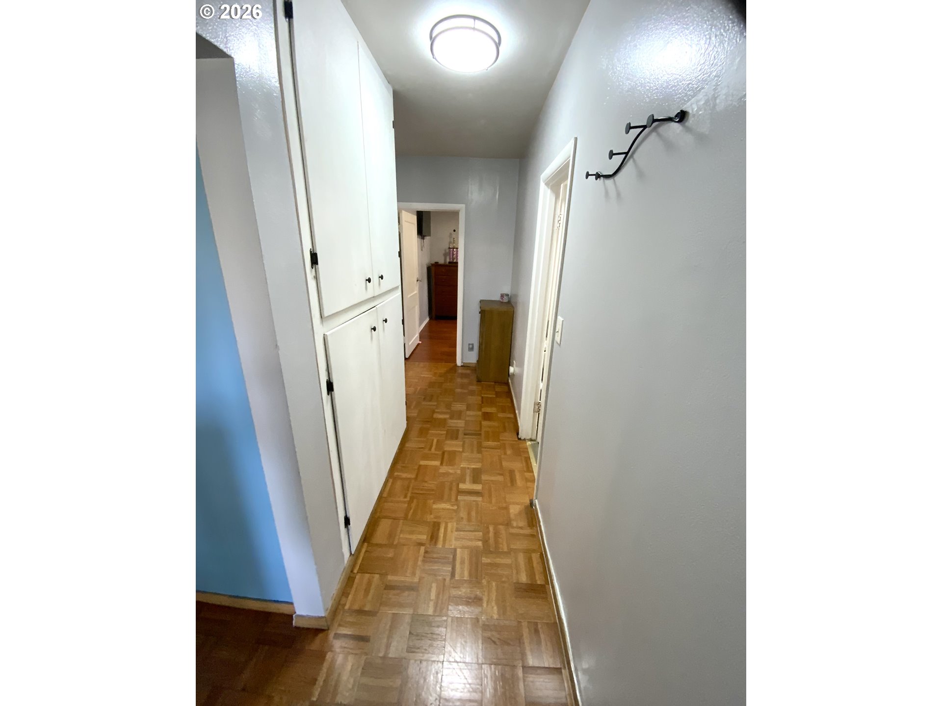 400 West 6th Street The Dalles, OR 97058 - Photo 9 of 28 a view of a hallway with wooden floor