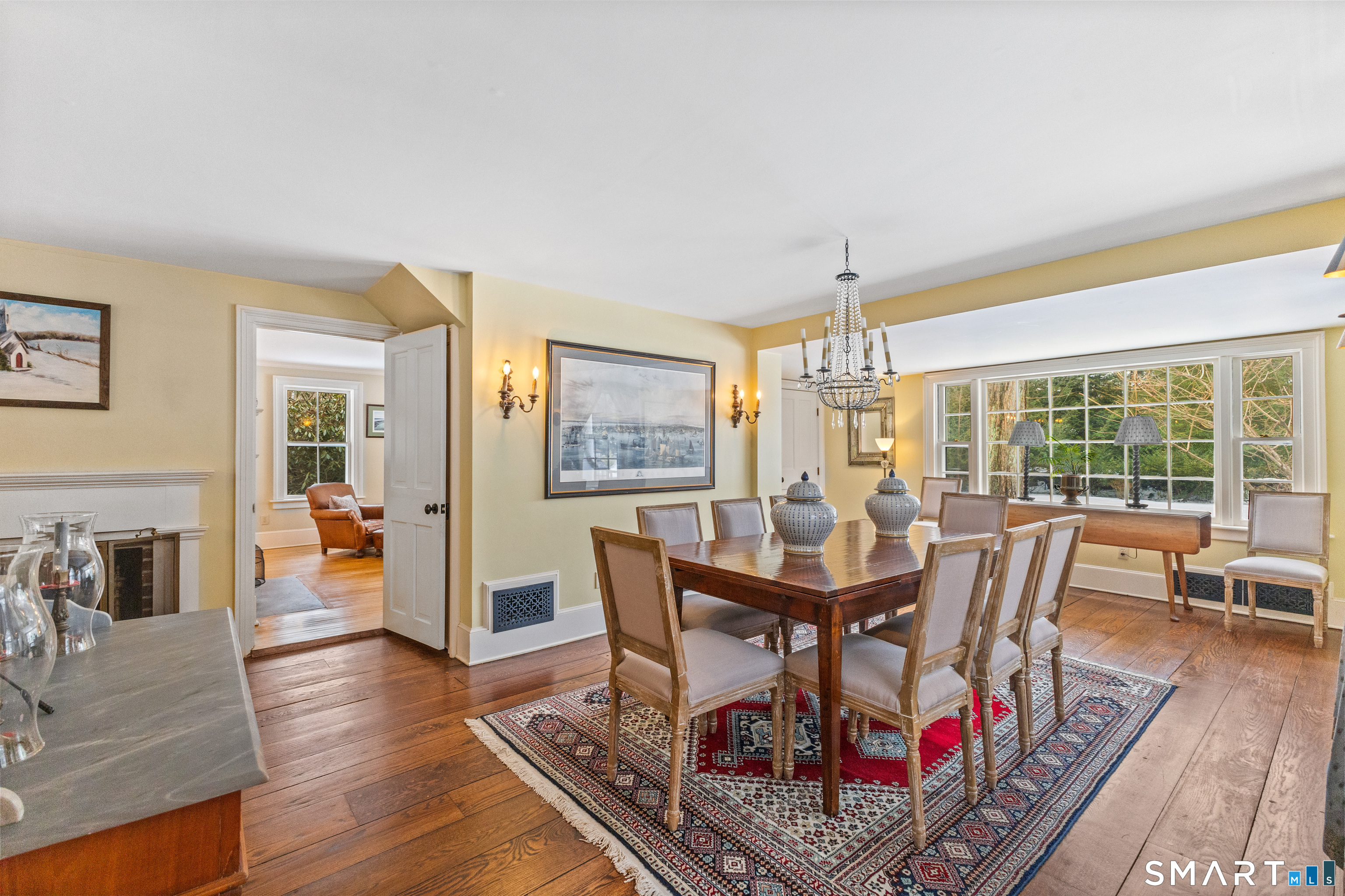422 Scofieldtown Road Stamford, CT 06903 - Photo 14 of 38 a view of a dining room with furniture window and wooden floor