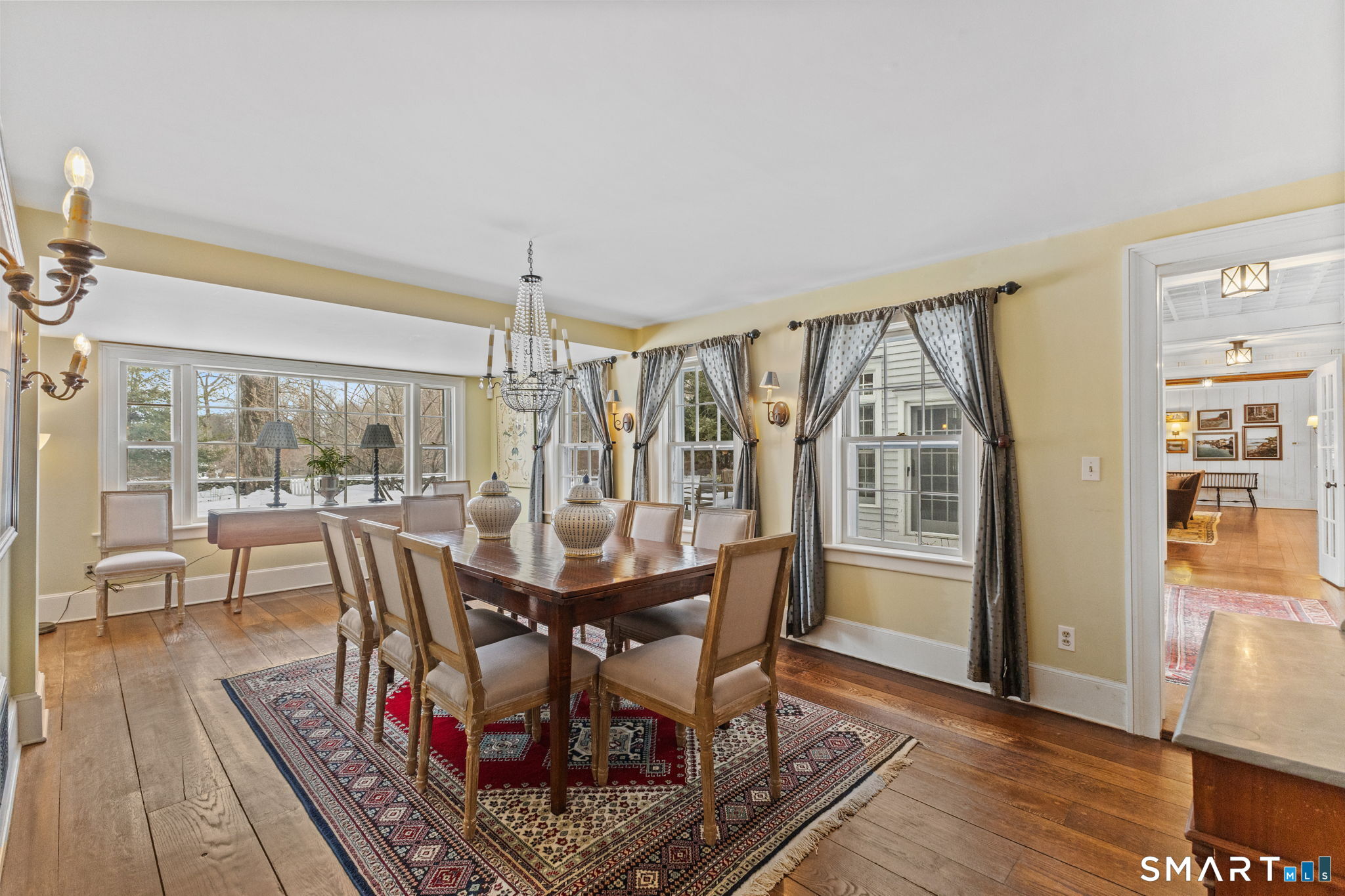 422 Scofieldtown Road Stamford, CT 06903 - Photo 15 of 38 a view of a dining room with furniture window and wooden floor