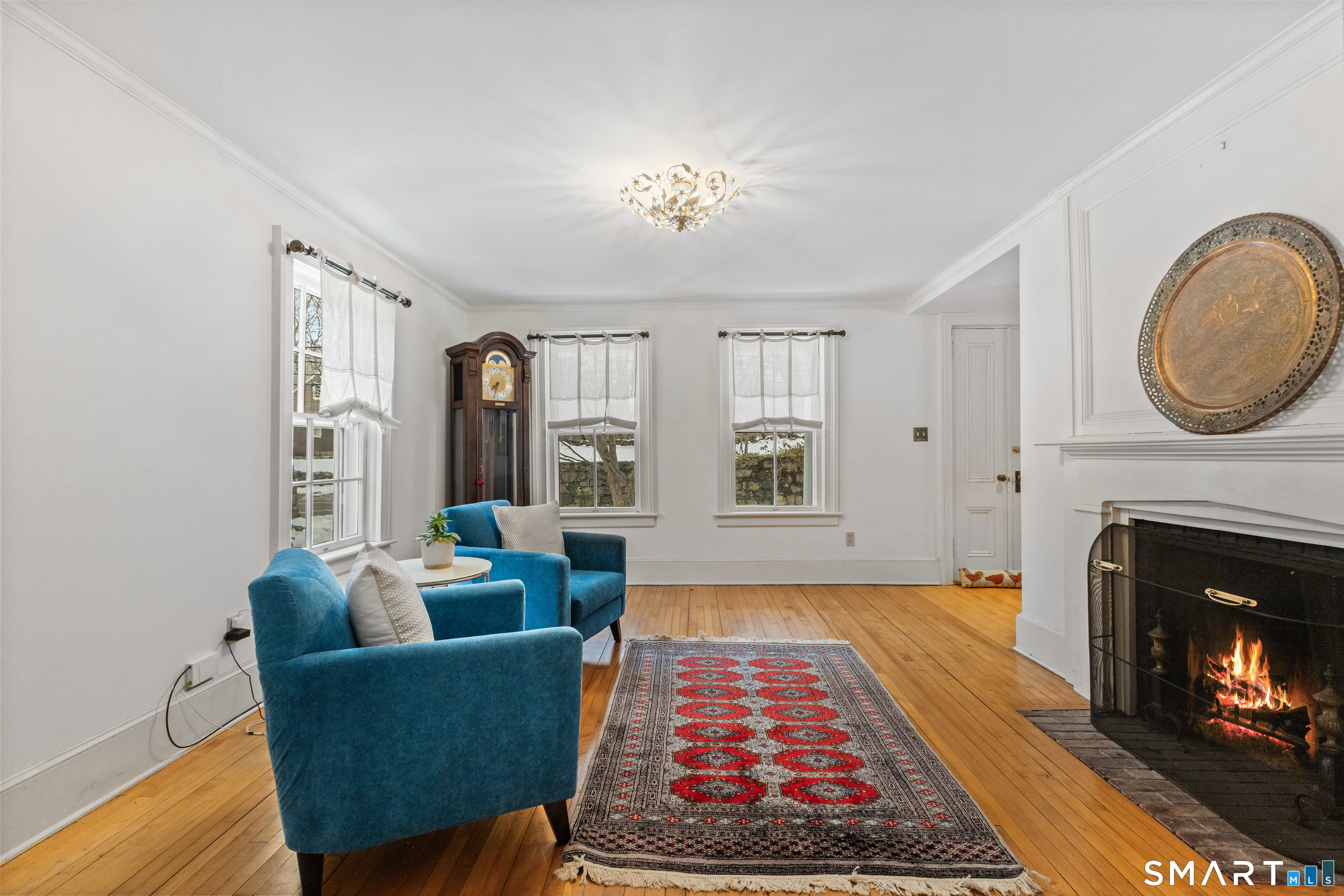 422 Scofieldtown Road Stamford, CT 06903 - Photo 16 of 38 a living room with furniture rug and window