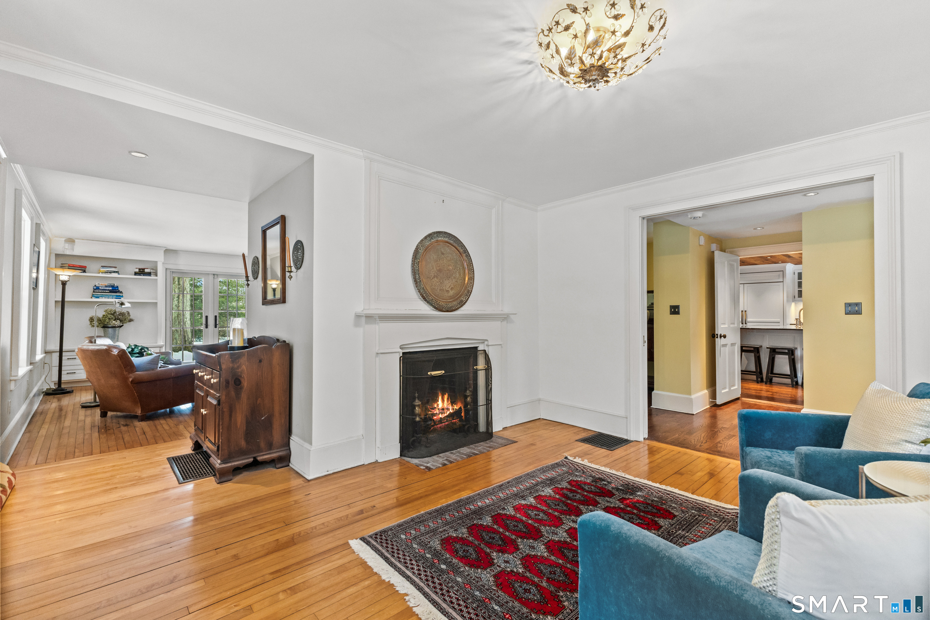 422 Scofieldtown Road Stamford, CT 06903 - Photo 17 of 38 a living room with furniture and a fireplace