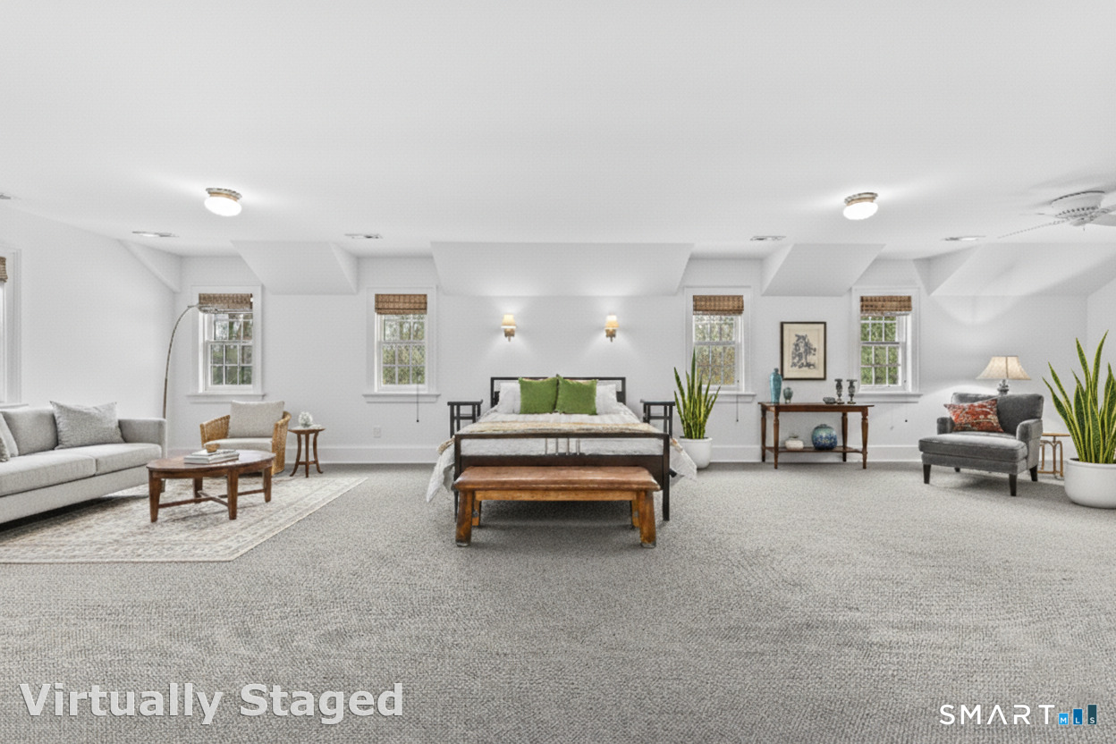 422 Scofieldtown Road Stamford, CT 06903 - Photo 22 of 38 a bedroom with furniture and a chair