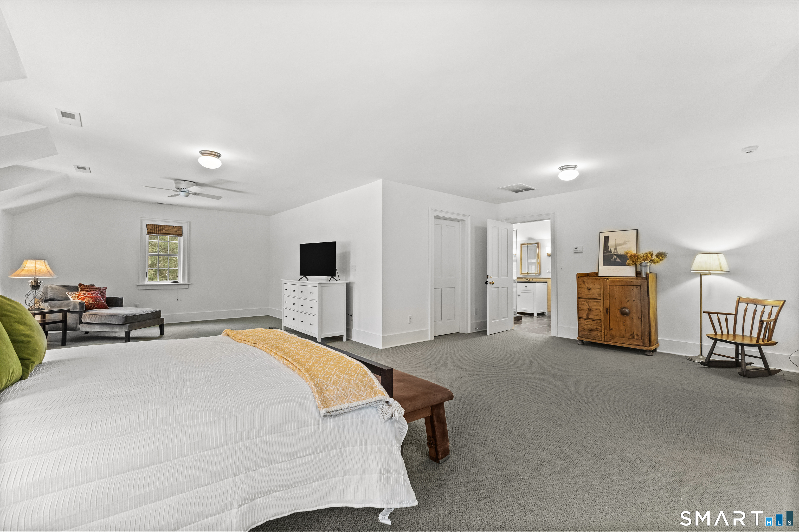 422 Scofieldtown Road Stamford, CT 06903 - Photo 23 of 38 a spacious bedroom with a bed and window