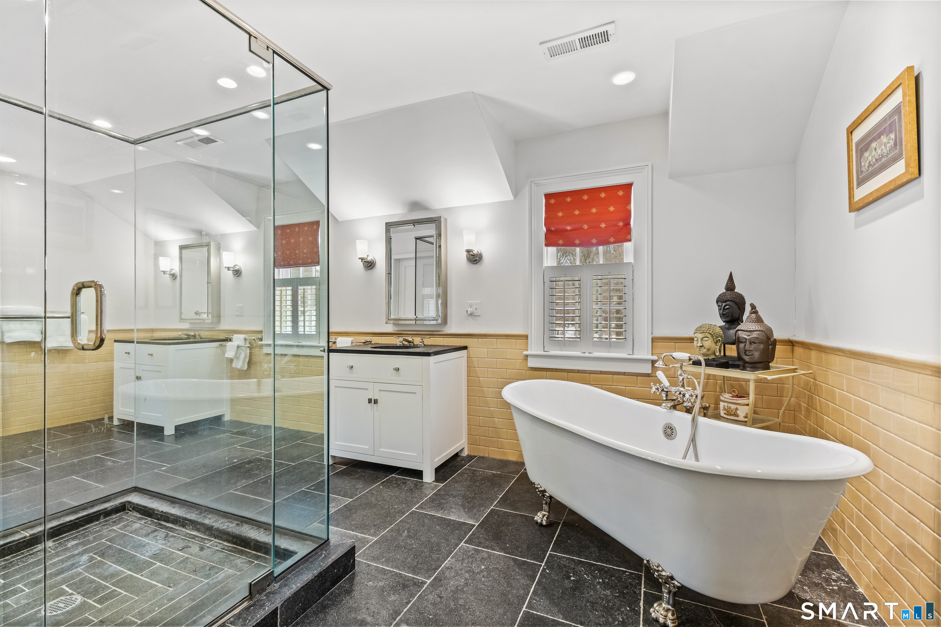 422 Scofieldtown Road Stamford, CT 06903 - Photo 24 of 38 a bathroom with a sink mirror and a bathtub