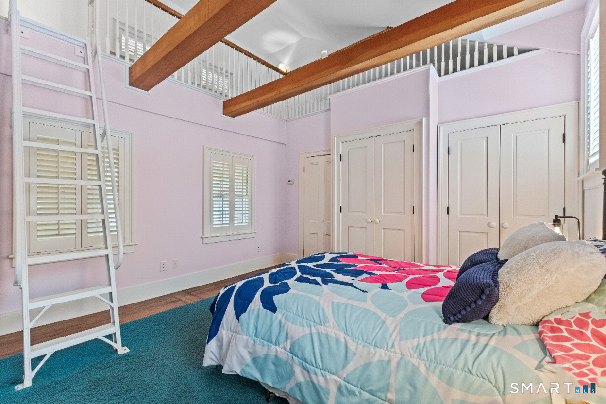 422 Scofieldtown Road Stamford, CT 06903 - Photo 25 of 38 a bedroom with a bed and a window