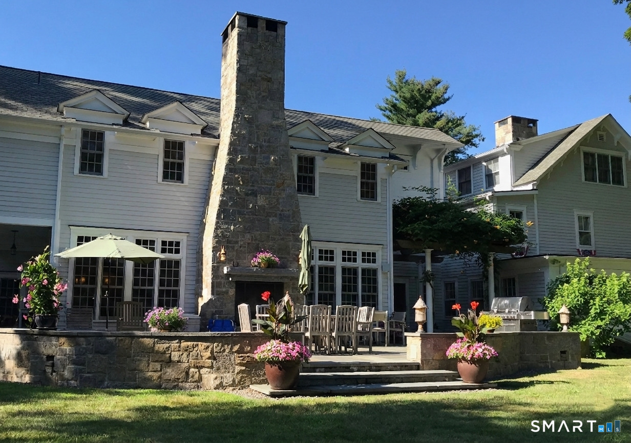 422 Scofieldtown Road Stamford, CT 06903 - Photo 38 of 38 a front view of a house with swimming pool and glass windows