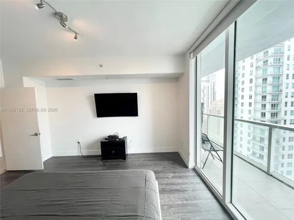 a view of a workspace with furniture