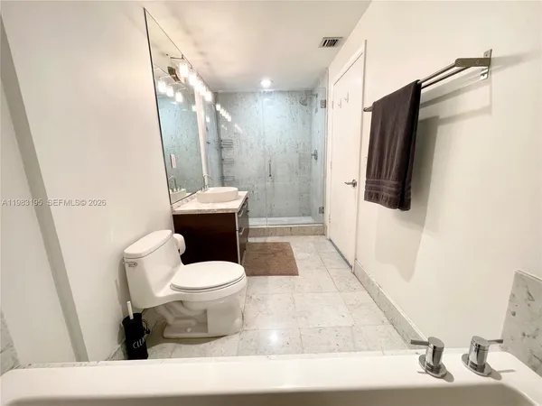 a view of a swimming pool with a yard