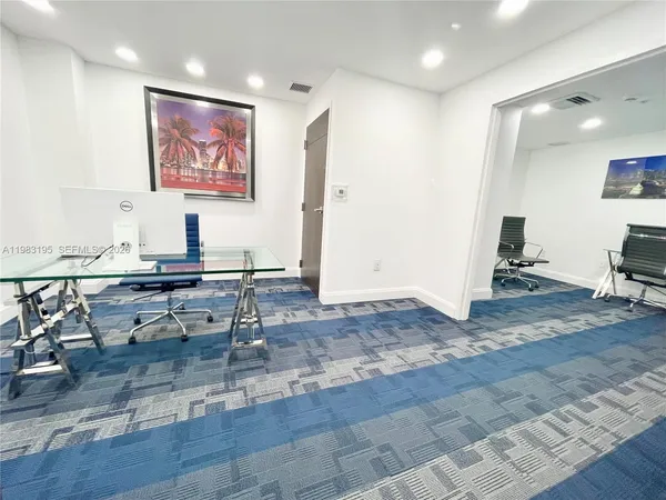 a view of a swimming pool with a lounge chairs