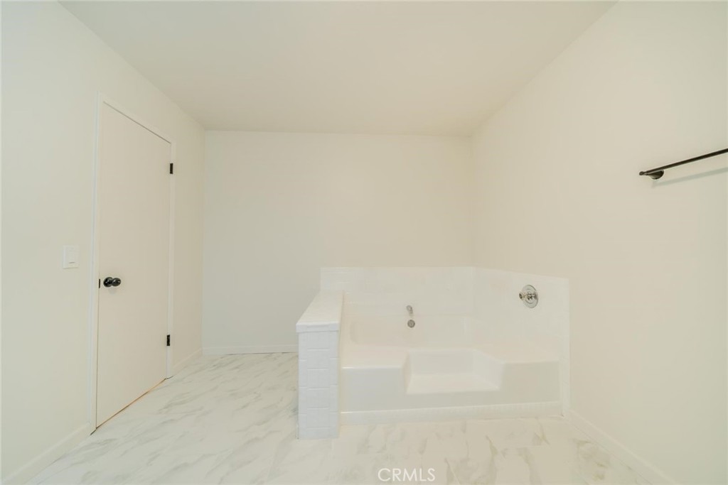 16754 Pauhaska Road Apple Valley, CA 92307 - Photo 15 of 19 a view of a bathtub