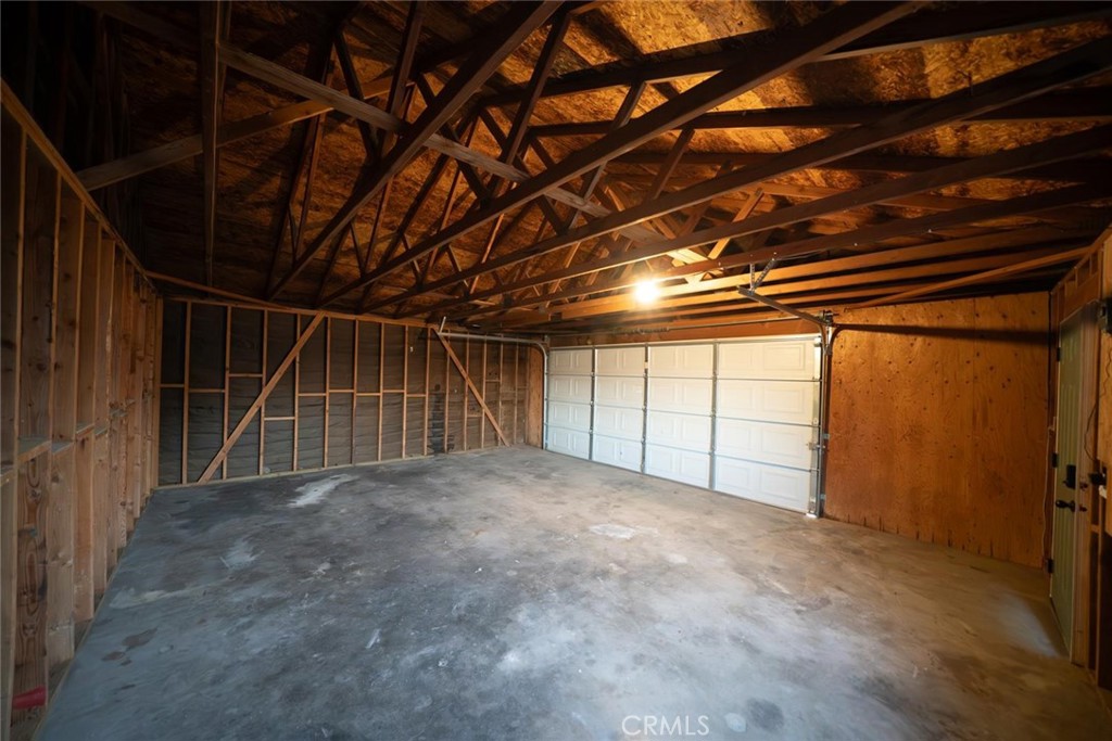 16754 Pauhaska Road Apple Valley, CA 92307 - Photo 17 of 19 a view of empty room with wooden floor