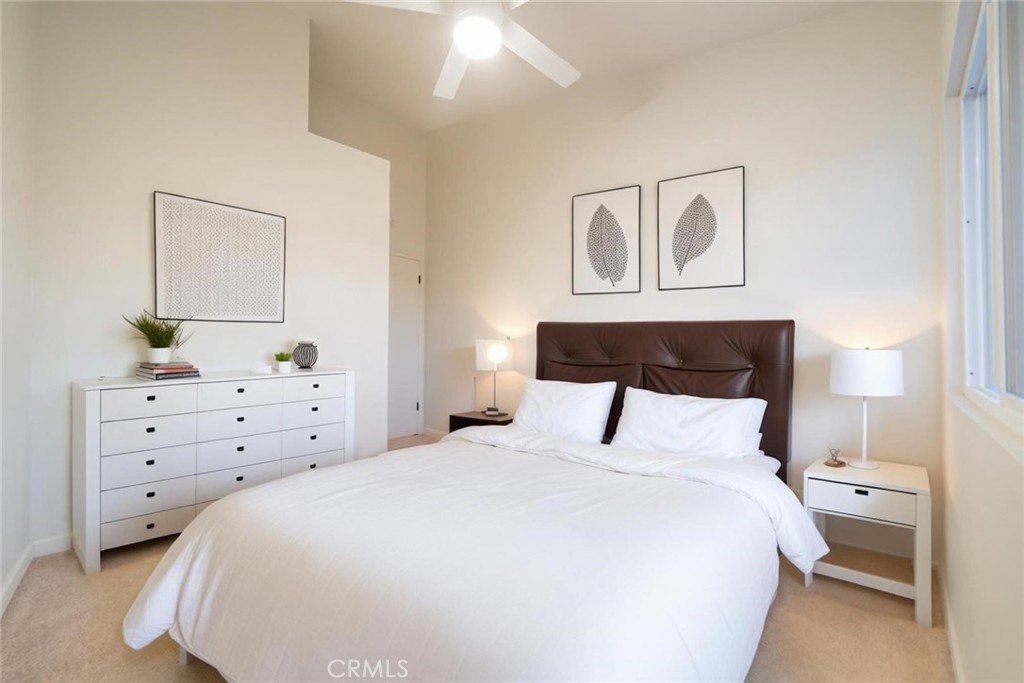 16754 Pauhaska Road Apple Valley, CA 92307 - Photo 8 of 19 a bedroom with a bed and a closet