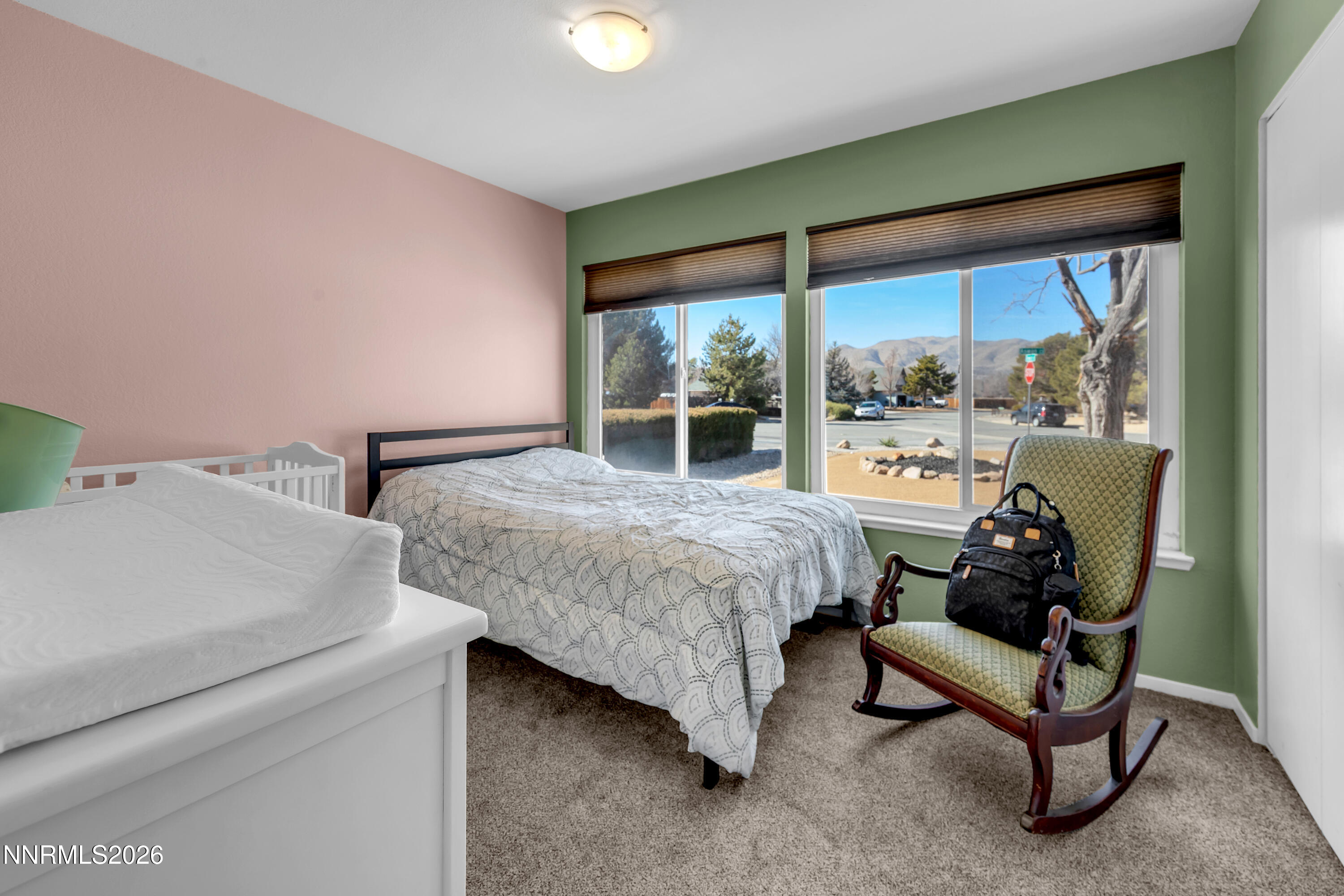 480 Aswan Street Sparks, NV 89441 - Photo 14 of 41 a bedroom with a bed chair and window