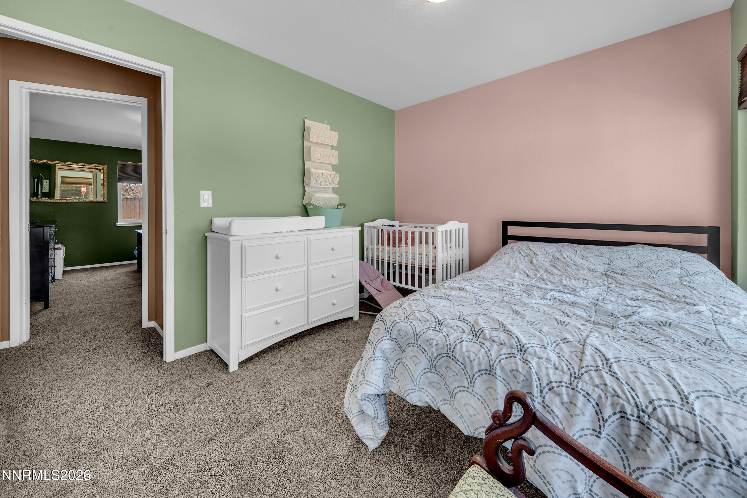 480 Aswan Street Sparks, NV 89441 - Photo 15 of 41 a bedroom with a bed and a cabinets