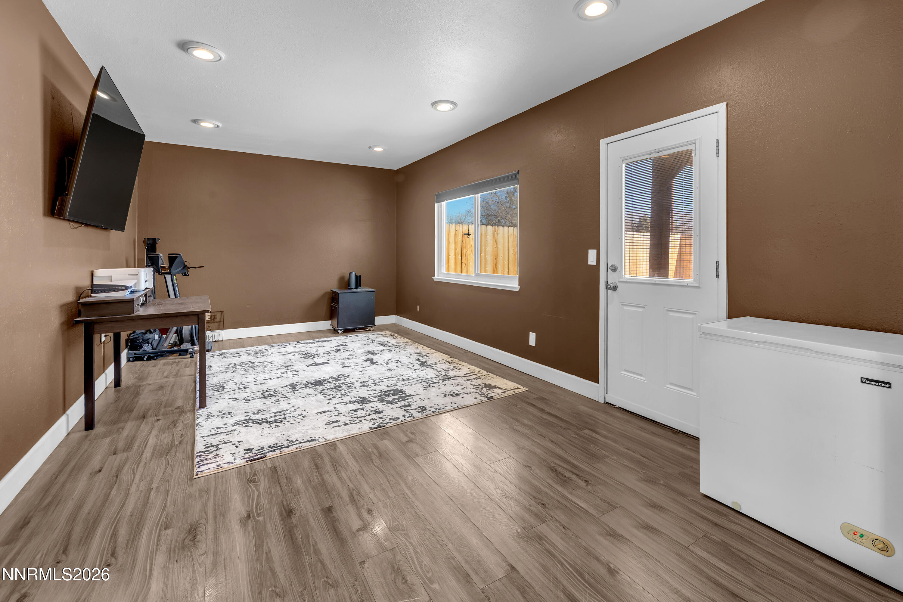 480 Aswan Street Sparks, NV 89441 - Photo 23 of 41 a workspace with wooden floor and a window