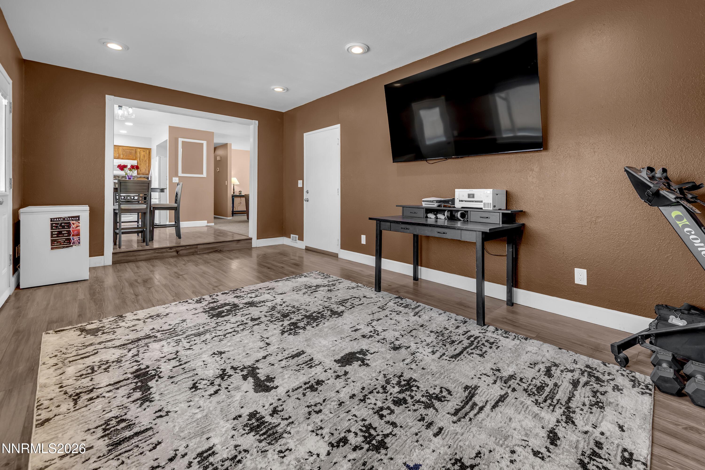 480 Aswan Street Sparks, NV 89441 - Photo 24 of 41 a living room with a flat screen tv and floor to ceiling window