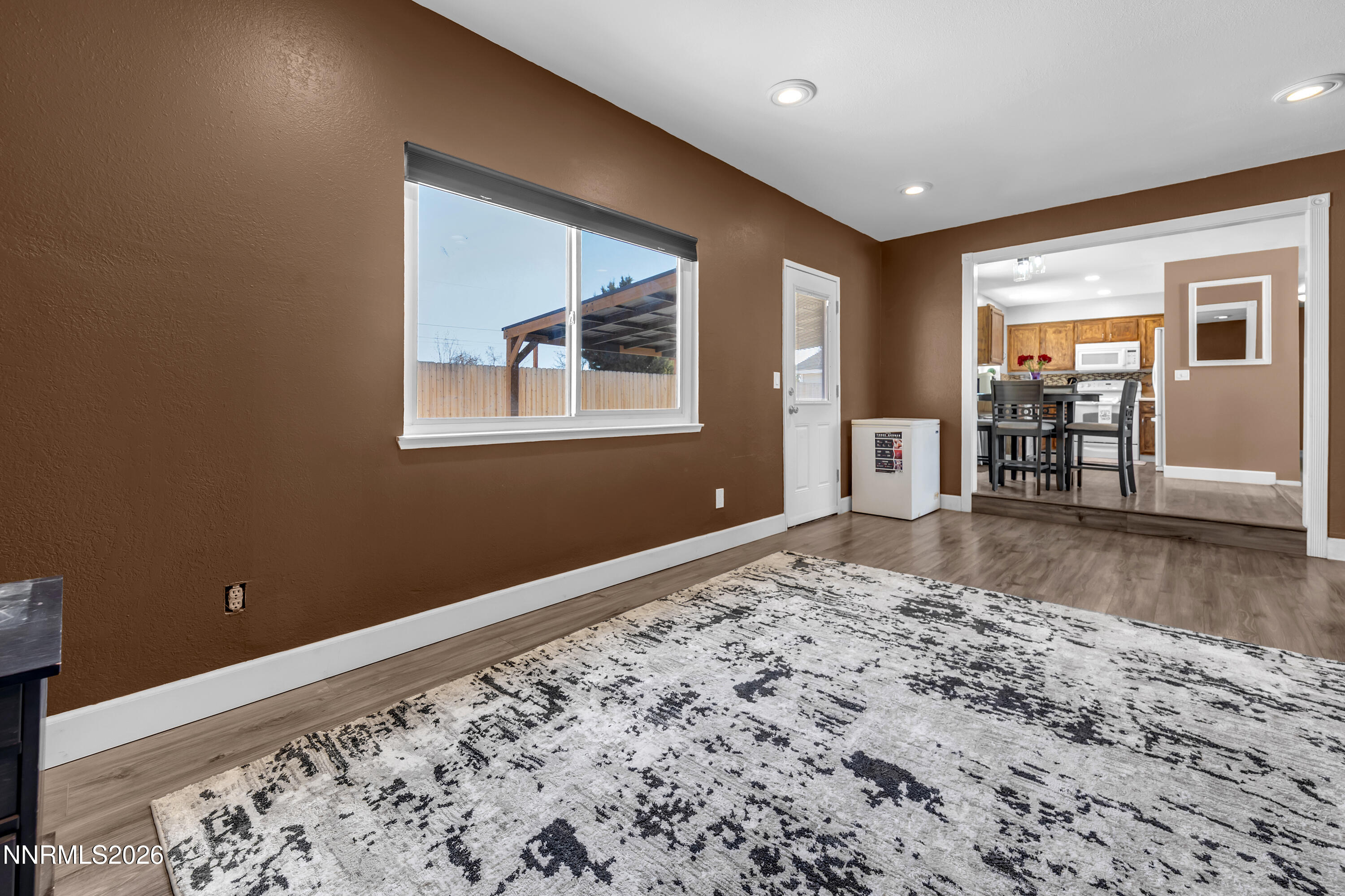 480 Aswan Street Sparks, NV 89441 - Photo 25 of 41 a view of a bedroom with wooden floor and closet
