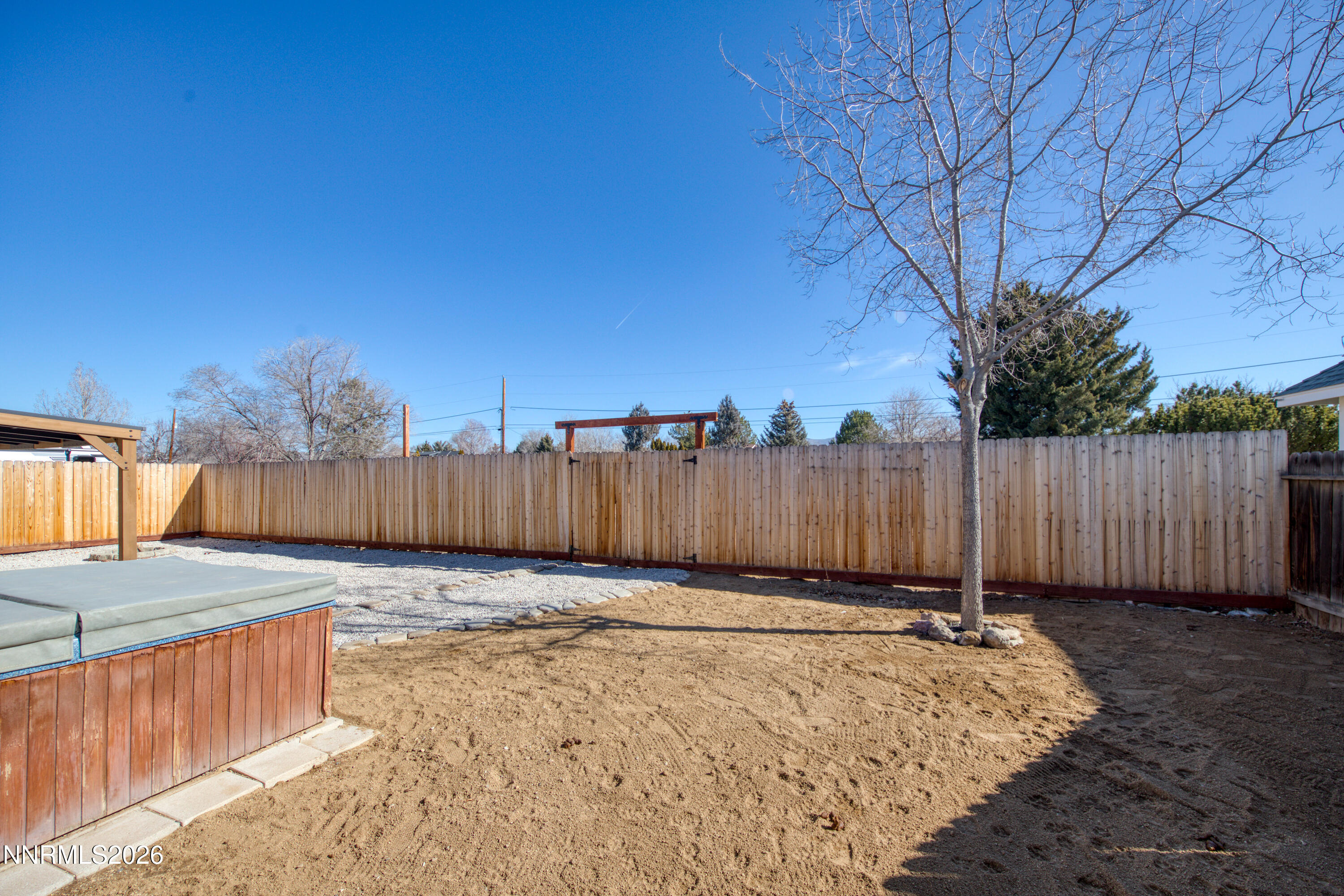 480 Aswan Street Sparks, NV 89441 - Photo 29 of 41 a view of a backyard with wooden fence