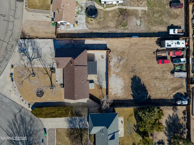 an aerial view of a houses with outdoor space