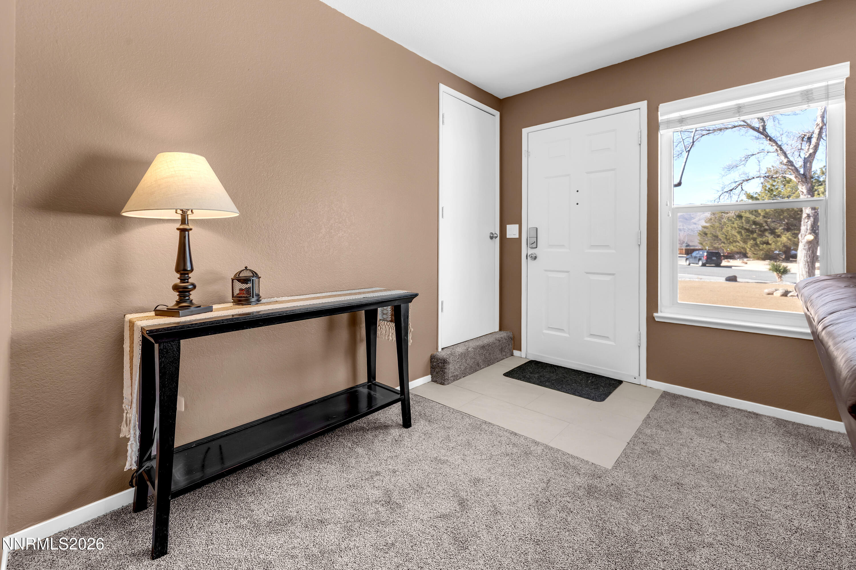 480 Aswan Street Sparks, NV 89441 - Photo 5 of 41 a living room with a bed furniture and a window