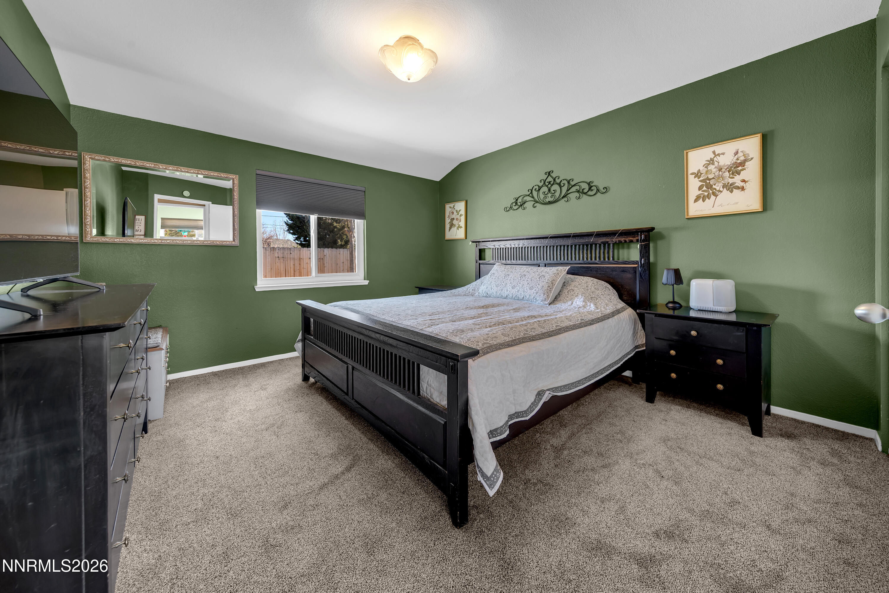 480 Aswan Street Sparks, NV 89441 - Photo 9 of 41 a bedroom with a bed and a window