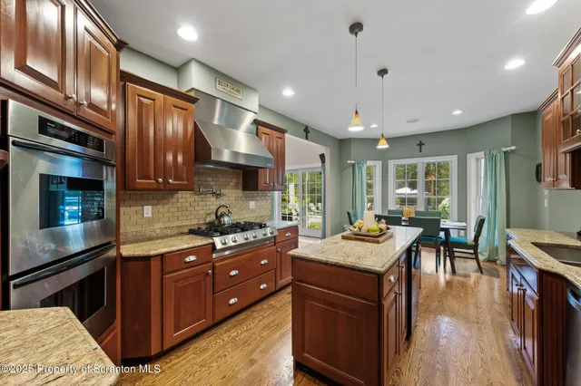 a living room with furniture and windows