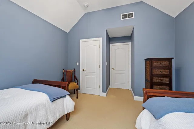 a room with furniture and a chandelier