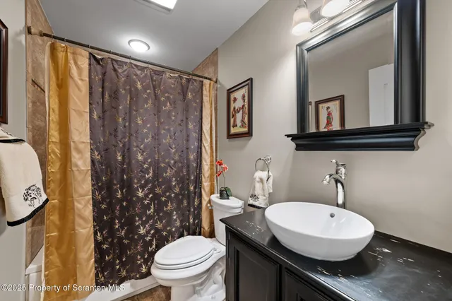 swimming pool view with a garden