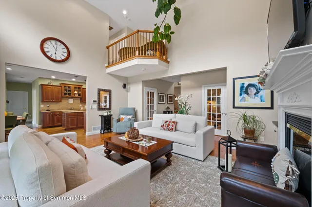 a kitchen with a stove and a wooden floors