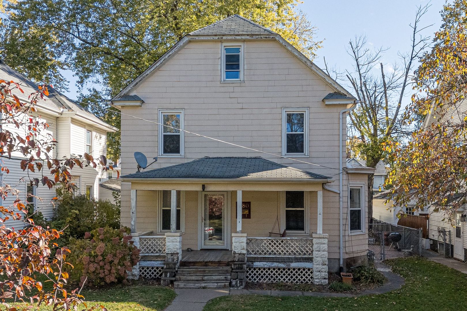 1180 25th Street Moline, IL 61265 - Photo 1 of 7 a front view of a house with a yard