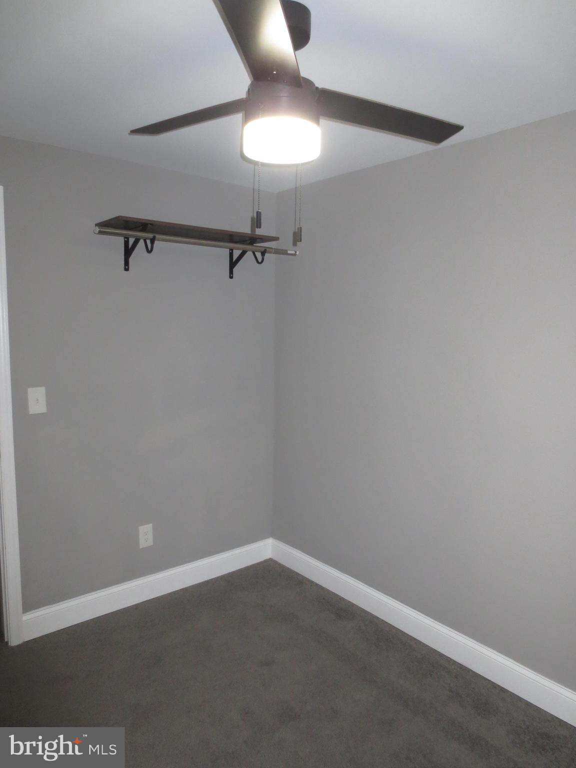 2027 Ramblewood Road Baltimore, MD 21239 - Photo 7 of 17 a view of a room with a fan