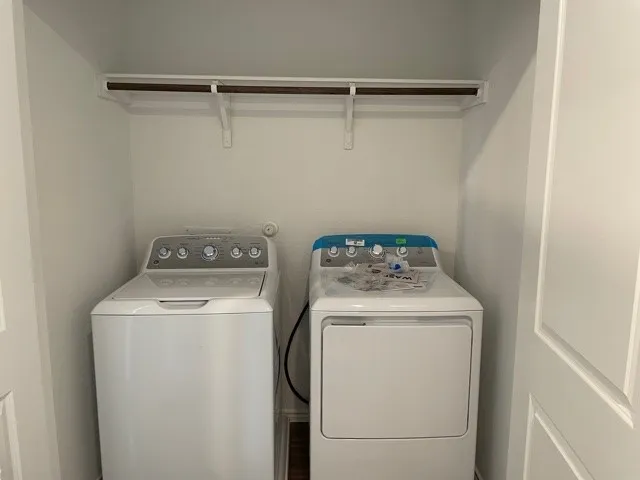 a kitchen with stainless steel appliances a refrigerator and a stove top oven