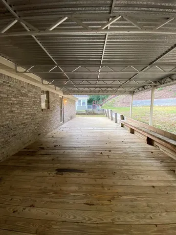 a house with trees in the background