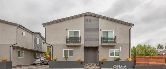 a view of a house with a patio