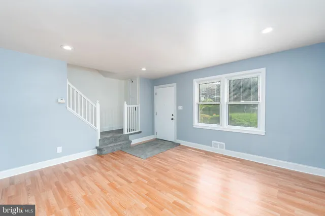 an empty room with windows