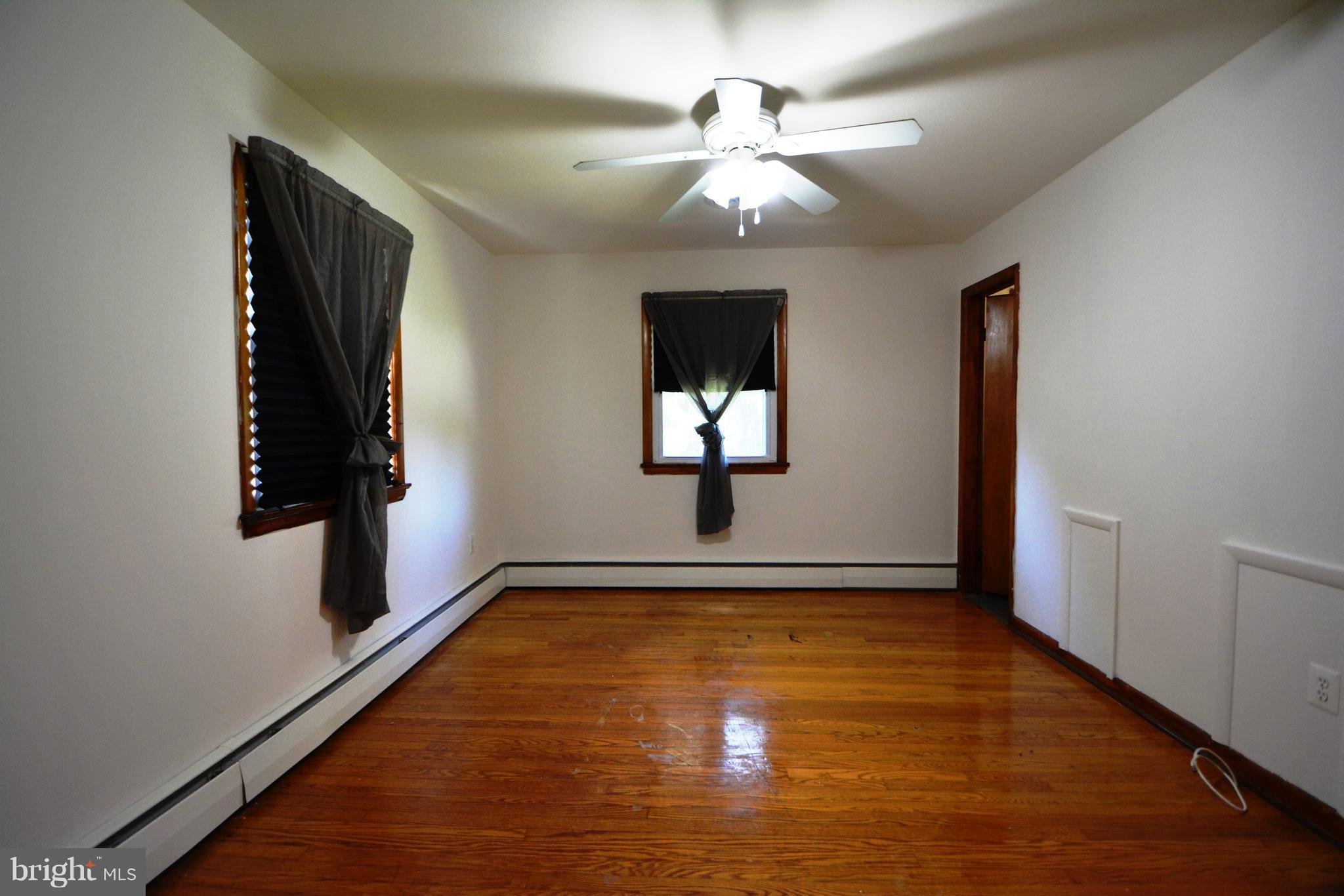 310 Hook Road Westminster, MD 21157 - Photo 20 of 30 Main level bedroom has two closets, entry to bath
