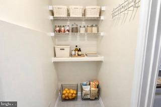 14905 Cleese Court, Unit E Silver Spring, MD 20906 - Photo 7 of 10 a shelf with cup and plates