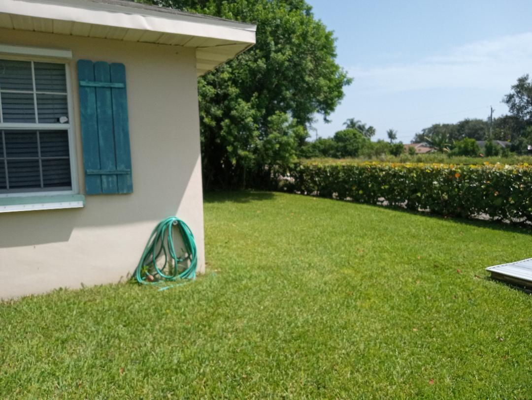 8696 Southeast Lyons Road Hobe Sound, FL 33455 - Photo 16 of 21 8696 se lyons front 331