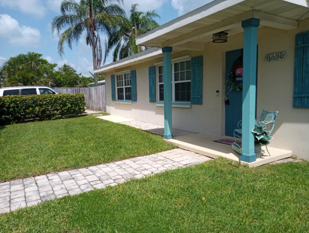 8696 Southeast Lyons Road Hobe Sound, FL 33455 - Photo 9 of 21 8696 se lyons front 41