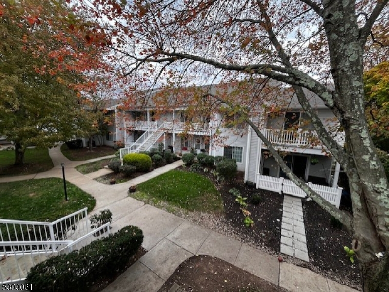 8 Larkspur Court Bedminster, NJ 07921 - Photo 19 of 19 a front view of a house with garden