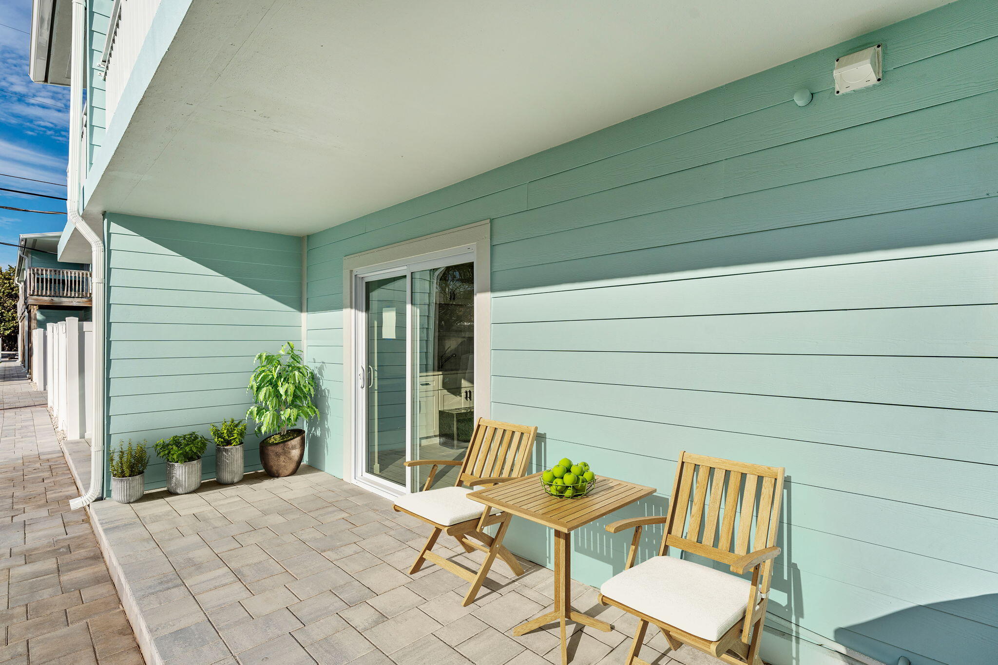 122 Central Road, Unit 105 Indian Harbour Beach, FL 32937 - Photo 9 of 15 a view of patio with couple of chairs