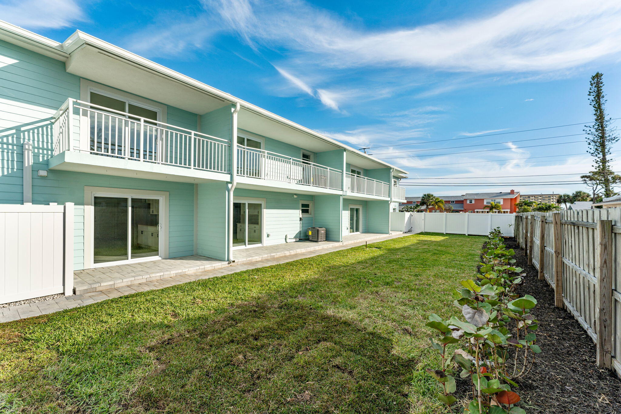 122 Central Road, Unit 105 Indian Harbour Beach, FL 32937 - Photo 10 of 15 a view of a house with a small yard