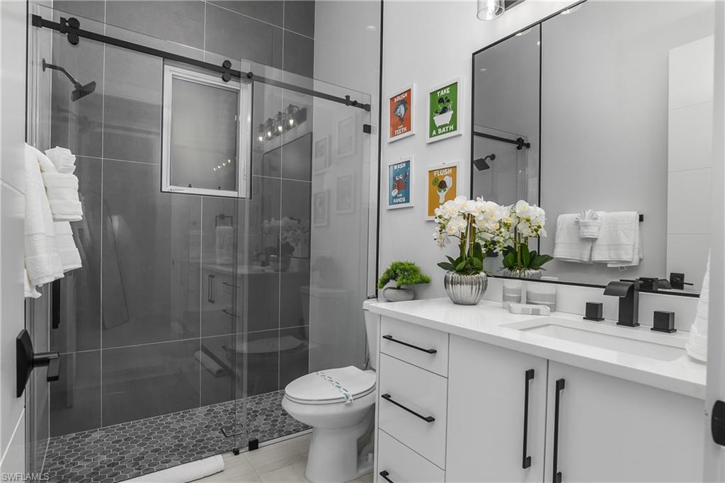788 9th Street Southwest Naples, FL 34117 - Photo 16 of 46 a bathroom with a sink toilet and shower