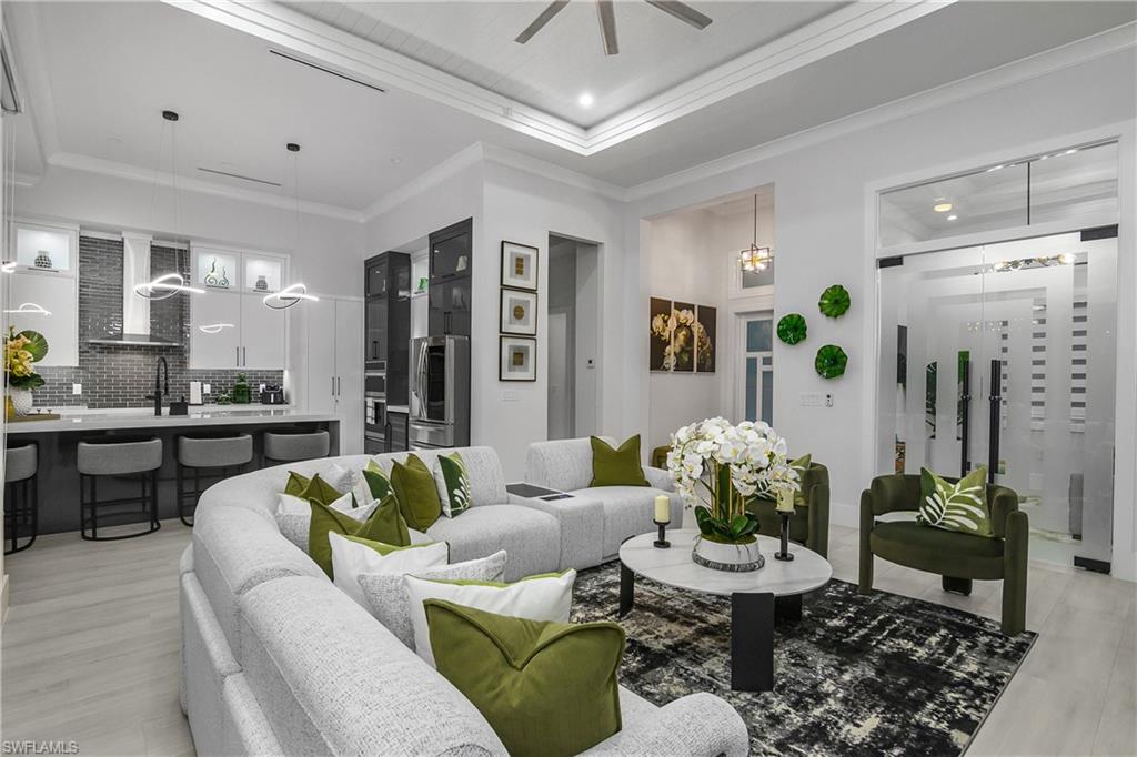 788 9th Street Southwest Naples, FL 34117 - Photo 28 of 46 a living room with furniture and wooden floor