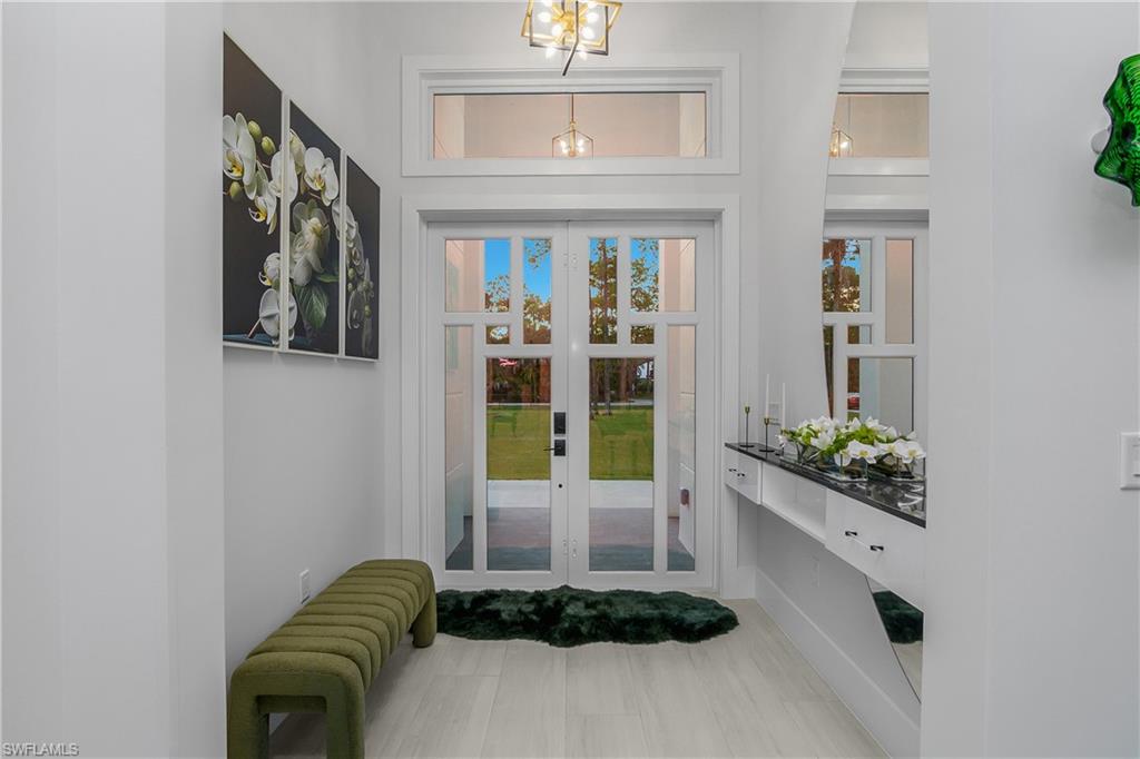 788 9th Street Southwest Naples, FL 34117 - Photo 31 of 46 a front view of a house with entryway