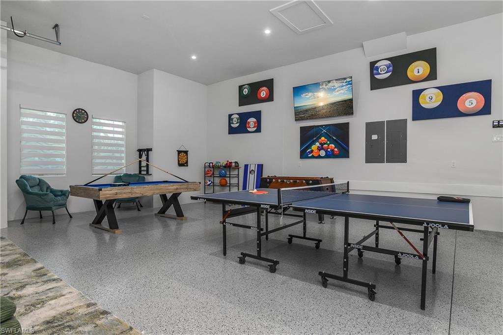 788 9th Street Southwest Naples, FL 34117 - Photo 35 of 46 a living room with furniture and a rug