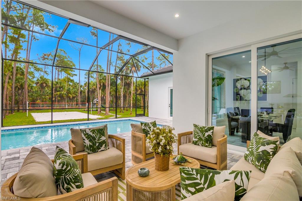 788 9th Street Southwest Naples, FL 34117 - Photo 43 of 46 a living room with furniture and a large window